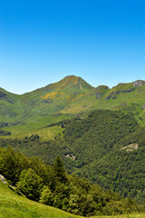 Magnificent view with a volcanic mountains in a national park in a wild region, in Auvergne
