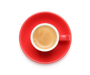 Aromatic coffee in red cup on white background, top view