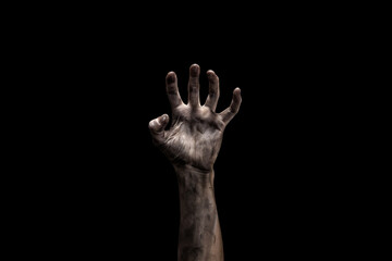 Bloody dirty zombie hand on black background with copy space. Halloween concept. 