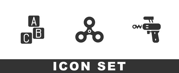 Set ABC blocks, Fidget spinner and Ray gun icon. Vector