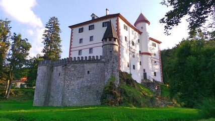 Fototapeta na wymiar Slovenia, Castle Snežnik with green park