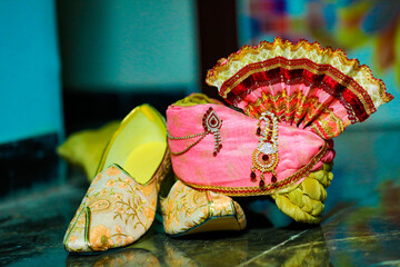 Traditional indian wedding ceremony : Groom wedding shoes and pagadi