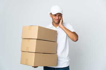 Delivery Brazilian man isolated on white background frustrated and covering ears