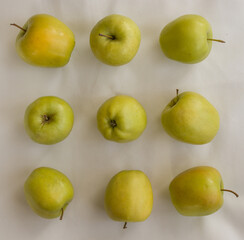 green apples on a tablecloth