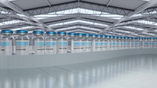 covid-19 coronavirus vaccine production filling manufactoring line,vials carried along on the conveyor belt inside a big warehouse storage