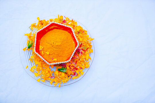 Traditional wedding ceremony in Hinduism: Turmeric in plate for haldi ceremony