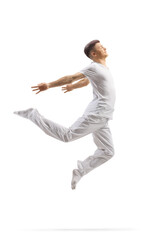 Guy in white clothes dancing a modern ballet
