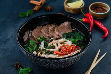 Pho bo, Vietnamese food, rice noodle soup with sliced beef