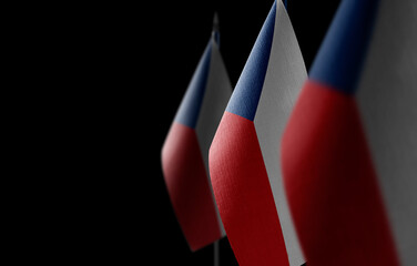 Small national flags of the Czechia on a black background