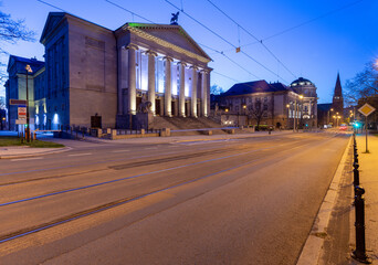 Poznan. Facade of the building of the opera house at sunrise.