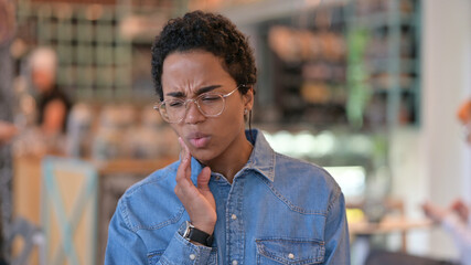 Portrait of Attractive Young African Woman having Toothache