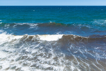 The steep ramparts of the Black Sea roll up on the coast of the Crimean Cape Tarkhankut.