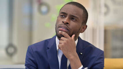 Portrait of African Businessman Thinking about Something 