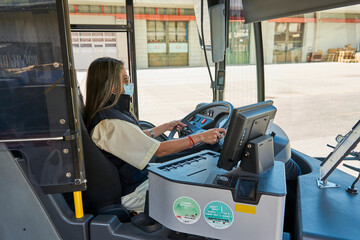a driver woman working in bus