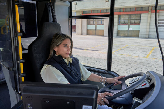 a driver woman working in bus