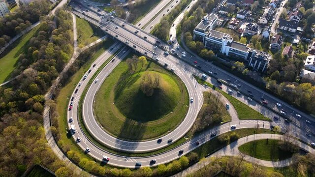 Timelapse aerial of traffic during rush hour, motorway in Munich Germany Europe in 4k, intersection with lots of cars in urban area ,drone