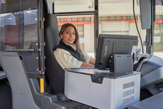 a driver woman working in bus