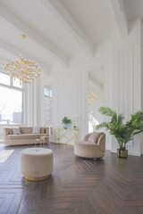 very light and bright interior of luxurious cozy living room with chic soft beige furniture with gold metallic elements, huge window to the floor and wooden parquet