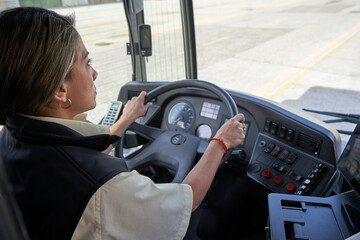 a driver woman working in bus