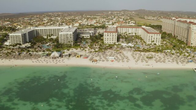 aerial image with drone from the palm beach beach in Aruba in the caribbean