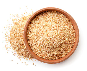 Amaranth seed in wooden plate on white background, isolated. The view from top