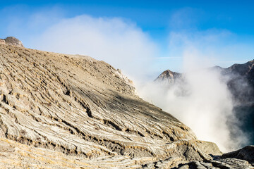 Mountain furrows wave surface pattern from lava flow at the top of Ijen volcano crater.Beautiful...