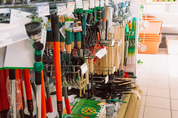 Gardening tools on the shelves of the store