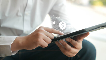 close up businessman hand use digital tablet to touchscreen by unlock password on electronic wallet...