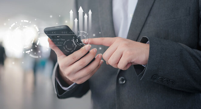 close up on businessman hand use smartphone to checking performance of upgrade system to improve and develop about future technology for globalization and business concept