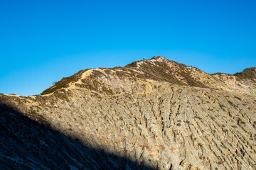 Mountain furrows wave surface pattern from lava flow at the top of Ijen volcano crater.Beautiful...