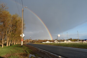 Rainbow after rain, early spring, April.