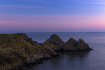 three cliffs sunset