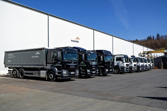 OLPE, GERMANY - APRIL 25, 2021: ArcelorMittal trucks at warehouse.