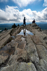 hiker on top of mountain