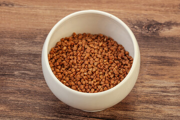Raw buсkwheat cereal in the bowl