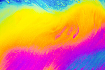 Rainbow colors. Psychedelic multi colored patterns background. Photo macro shot of soap bubbles