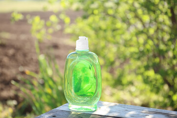 Green Plastic Bottle for Shampoo, Liquid Soap or Lotion.