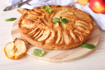 Appetizing pie close-up on a wooden background