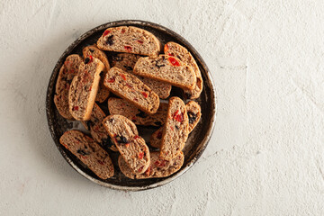 Italian cantuccini cookies with strawberries and raisins. Biscotti cookies with copy space for text.