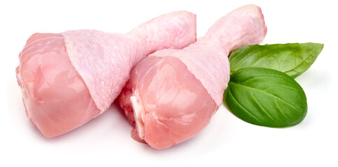 Raw chicken drumsticks, isolated on white background. High resolution image