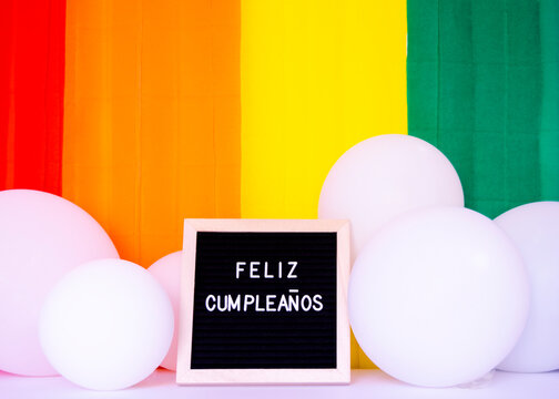 Happy Birthday sign with balloons and colorfull background