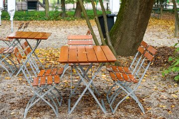 Benches and chairs at tables invite you to relax and unwind