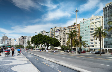  View of the Avenida Atlantica. People go about their business