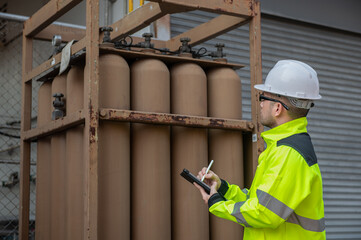 Engineers work place to keep liquid helium,preventive maintenance schedule checking,Thailand people