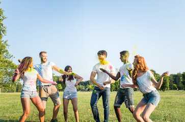 Friends playing with holi powder