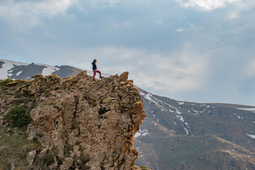 person on the top of the mountain