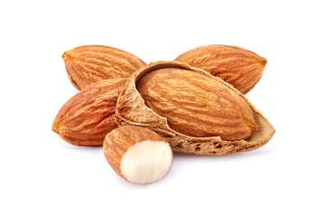 Almonds in closeup isolated on white background. Nuts isolated.