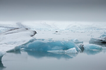 Iceland's glacier Jokulsarlon through the breakaway icebergs.
