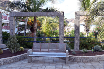 Modern Steel Bench in Public Garden at Spanish Hotel  © eyepals