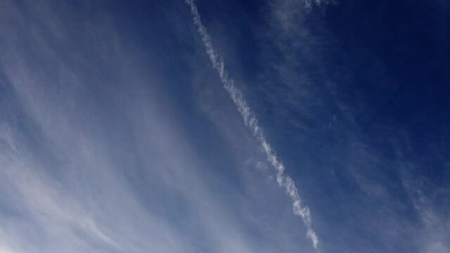 Time-Lapse of Blue Sky with Cirrus Clouds and Jet Contrails
